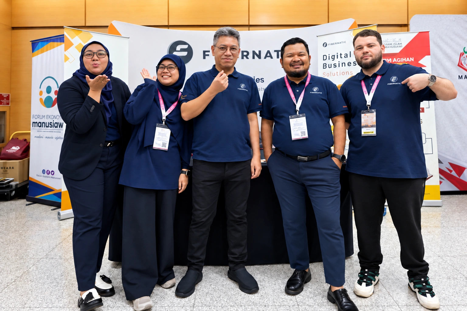 Five Fibernatic team members together at an event booth